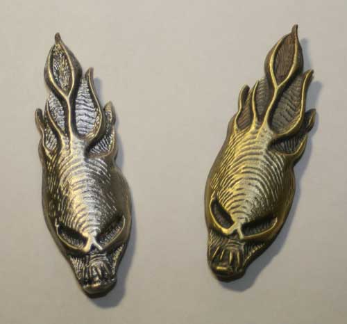 commercially produced head badges